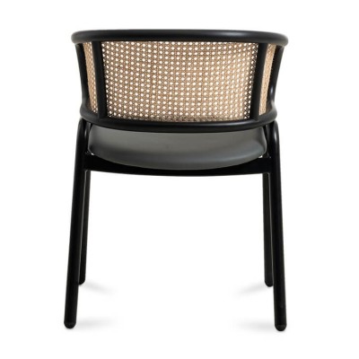 Sedia Morley in Rattan Naturale e base in acciaio laccato nero.